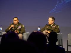 Col. Arnel David (l) and Lt. Col. Ash Lubecke discuss NATO’s Maven Smart System in Brussels. Credit: Infodos