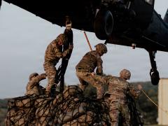 Illinois Army National Guard Black Hawk Crew conducts sling load resupply at Camp Grayling Joint Maneuver Training Center in Grayling, Michigan, in August. Credit: Spc. Davanh Sanamixay