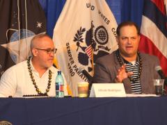 Alfredo Rodriguez, deputy director for the Department of War (DOW) Office of the Chief Information Officer's Workforce Innovation Directorate, and Matthew Isnor, chief, Cyber Workforce Development at the DOW Chief Information Oﬃce, participate in a panel at TechNet Indo-Pacific in Honolulu. Credit: Artistic Mindz Photography