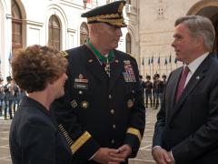 Gen. Raymond T. Odierno, USA (Ret.) (c) , and his wife, Linda (l), speak in 2013 with David Thorne, former U.S. ambassador to Italy, during a ceremony at the Italian army headquarters in Rome, when Gen. Odierno received the Order of Merit of the Italian Republic. The general passed away last weekend at age 67. Credit: U.S. Army photo by Staff Sgt. Teddy Wade