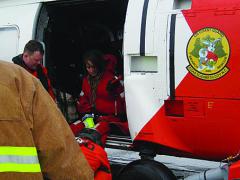 A U.S. Coast Guard helicopter delivers passengers from the sailing ship Bounty after the ship foundered during superstorm Sandy last October. 