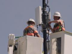 Technicians from Verizon install a 5G node in Indianapolis. The different bandwidths offered by the new cell technology offer a host of new capabilities for commercial and military users. Verizon