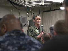 Vice Adm. Andrew Lewis, USN, commander, U.S. Second Fleet (c), speaks to USS Gerald R. Ford's (CVN 78) wardroom during a visit to the Navy's newest aircraft carrier. Adm. Lewis spoke at MILCOM 2019. U.S. Navy photo by Mass Communication Specialist 3rd Class Sean Elliott