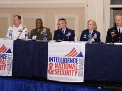 A row of service intelligence chiefs describes today's threats and needed solutions in a panel chaired by (far l) Vice Adm. Jake Jacoby, USN (Ret.). The panelists are (l-r) Vice Adm. Matthew Kohler, USN; Brig. Gen. Dmitri Henry, USMC; Rear Adm. Robert Hayes, USCG;Lt. Gen. VeraLinn “Dash” Jamieson, USAF; and Lt. Gen. Scott Berrier, USA. Photography by Herman Farrer