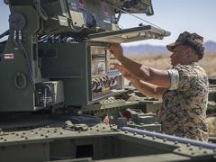 U.S. Marines conduct a routine check up on an AN/TPS-59 radar. New agile spectrum efforts by the Defense Information Systems Agency (DISA) aim to allow more efficient spectrum use on the battlefield while sharing spectrum with civilian bandwidth users. Credit: U.S. Marine Corps photo by Lance Cpl. John Hall, USMC