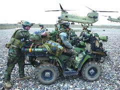 MARSOC Marines, above, prepare to board CH-47 Chinook helicopters as part of a two-day presence patrol with Afghan Commandos in Farah province.