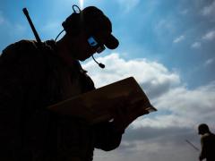 A U.S. Air Force captain radios an aircraft heading for a landing on a highway in Bulgaria during the exercise Thracian Summer 2021. The Defense Information Systems Agency (DISA) is placing high emphasis on improving command and control as part of its new strategy. USAF photo