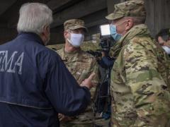 FEMA Regional Administrator Thomas Von Essen and Maj. Gen. Bill Hall, USA, former commander, Joint Task Force Civil Support, during a visit to New York City and USNS Comfort in April 2020. The U.S. Northern Command, which responds to domestic humanitarian crises, and the other combatant commands could expand the use of artificial intelligence through specialized teams at each command. Credit: U.S. Navy photo by Specialist 1st Class Kleynia McKnight