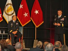 Maj. Gen. David Bassett, USA, and Maj. Gen. Peter Gallagher, USA speak at AFCEA's TechNet Augusta conference. Photo by Michael Carpenter