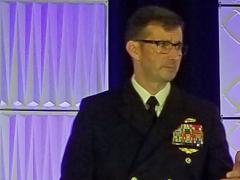 Rear Adm. Christian "Boris" Becker, USN, commander of SPAWAR, speaks at MILCOM. Credit: Katie Helwig