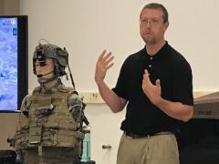 Lead Engineer Dan Lenhardt of the Communications-Electronics Research, Development and Engineering Center (CERDEC) explains the new speech recognition platform that the center developed to facilitate hands-free computer interaction for soldiers on the move.
