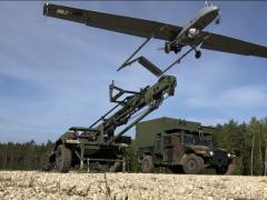 U.S. Army soldiers launch an unmanned aerial vehicle (UAV) for surveillance and reconnaissance in Germany. Research by the Intelligence Advanced Research Projects Activity (IARPA) aims to provide UAVs, along with various small handheld devices, with power sources providing twice the energy and 10 times the shelf life of conventional batteries in extreme environments. Credit: U.S. Army photo