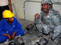 A member of the Army Corps of Engineers examines filter actuators at a water treatment plant in Baghdad. With a presence in more than 20 countries worldwide, the Corps is modernizing its infostructure to maintain connectivity with minimum downtime and maximum operational options.  U.S. Army Corps of Engineers photo