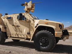 The U.S. Marine Corps has elected to continue the use of and maintain Boeing’s Compact Laser Weapons System, pictured installed on a Joint Light Tactical Vehicle. Credit: Boeing