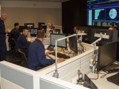 The addition of cyber offense capabilities by the U.S. Coast Guard Cyber Command marks another step in the service’s growing cyber versatility, says the leader of the command, Rear Adm. Michael Ryan, USCG (l), speaking to Coast Guardsmen in the command’s Cyber Operations Center in Washington, D.C. Credit: USCG Cyber Command