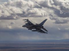 A 40th Flight Test Squadron F-16D Fighting Falcon prepares to drop four bombs for the second Golden Horde test mission designed to provide proof of concept for collaborative autonomous weapons. U.S. Air Force photo by Tech. Sgt. John Raven, USAF