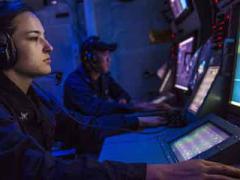 A sonar technician onboard the guided missile destroyer USS Mustin stands watch in the ship’s sonar center. With cyberspace being a warfighting domain, the U.S. Navy’s information networks are a major target that must be protected and defended proactively.