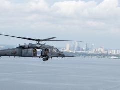 An HH-60 Pave Hawk helicopter assigned to the 305th Rescue Squadron at Davis-Monthan Air Force Base, Arizona, flies during an exercise above the waters of Tampa Bay, Florida, in November. The Air Force is pursuing innovative digital high frequency solutions as another communications tool for airmen and Joint warfighters. U.S. Air Force photo by Airman 1st Class Ryan C. Grossklag