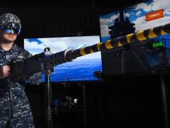 Lt. Steven McGhan, USN, demonstrates a gun-augmented reality system at Trident Warrior 2017. In support of the Navy’s Optimized Fleet Response Plan, the Naval Information Warfighting Development Center (NIWDC) uses live, virtual and constructive training capabilities like these to effectively train the fleet. Navy photo by Alan Antczak