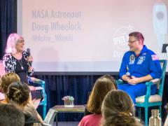 Beth Beck, l, the open innovation program manager in NASA’s Office of the Chief Information, discusses the agency’s Space Apps Challenge 2016, a global hackathon.