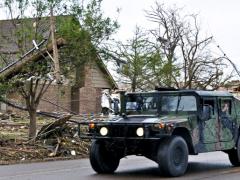 Members of the Oklahoma National Guard drive down Telephone Road in Moore, Oklahoma, May 21, 2013, en route to the neighborhoods devastated by a tornado. Cybersecurity needs to be a priority in the aftermath of major disasters when people and their personal data can be most vulnerable. U.S. Air Force photo by Senior Airman Mark Hyber
