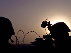 U.S. Army soldiers with the 4th Brigade Combat Team, 101st Airborne Division (Air Assault), perform security duty during a battle drill on Forward Operating Base Lightning, Afghanistan. As officials from the Defense Information Systems Agency (DISA) converge network management tools into a single solution, they intend to move carefully to avoid disrupting communications for warfighters.