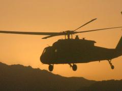 A UH-60 Black Hawk helicopter carries soldiers from the 10th Mountain Division on a mission in Afghanistan. The Afghan Mission Network provides unprecedented data sharing and operations planning capabilities among coalition partners and serves as the basis for the Mission Partner Network in development today.