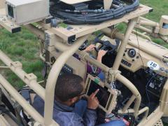 Army C5ISR Center employee Donovan Sweet conducts research for the C4ISR Modular Autonomy project at Camp Grayling, Michigan, in October. The Army wants to build a fast, agile and lethal Remote Combat Vehicle capable of avoiding electronic warfare and cyber attacks. Credit: Dan LaFontaine, Army public affairs official