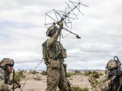 Soldiers assigned to 1st Stryker Brigade Combat Team use satellite communication systems at the National Training Center, Fort Irwin, California, in March. Next summer, the Army intends to take its premier command, control, communications, cyber, intelligence, surveillance and reconnaissance experiment to the Indo-Pacific theater. It will mark the service’s first full-sized technology development experiment in a combat theater. Credit: U.S. Army/Pfc. Rosio Najera