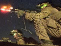 Army Rangers fire at an enemy bunker during a night live-fire training exercise. While live training always will be integral to Army readiness, the service intends to rely more heavily on gaming and simulation.