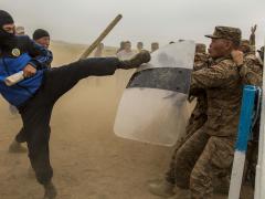 Mongolian troops participate in a riot-control exercise during Khaan Quest 2015 in Tavan Tolgoi, Mongolia. The Intelligence Advanced Research Projects Activity’s predictive analytics programs seek to improve forecasting for a variety of events, including civil unrest and political uprisings.