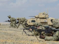 U.S Army soldiers assigned to the 155th Armored Brigade Combat Team, Task Force Spartan, bound toward an objective during a rehearsal for a 2018 combined live-fire exercise near Alexandria, Egypt. Brigade Combat Teams may not be the top priority for future budgets as wars are fought over longer distances. U.S. Army photo by Sgt. James Lefty Larime