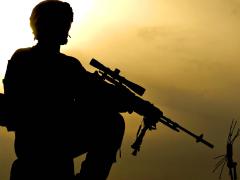 A U.S. Army soldier kneels atop a cliff overlooking the Arghandab River Valley in Afghanistan to provide security for his squad members as they climb up the cliff from the valley below. Army researchers aim to identify and develop persistent intelligence, surveillance and reconnaissance technologies to provide tactical-edge warfighters the data they need for rapid-fire decision making.