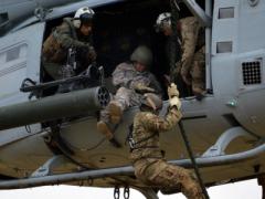 Soldiers with the 25th Infantry Division conduct fast rope insertion extraction techniques with their Marine Corps and Air Force counterparts. Elements of the 25th participated in the Army’s recent Cyber Blitz exercise, which will help define the future of cyber and spectrum warfare.