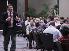 Terry Halvorsen, U.S. Defense Department chief information officer, addresses the crowd at AFCEA TechNet Asia-Pacific. Photo by Bob Goodwin