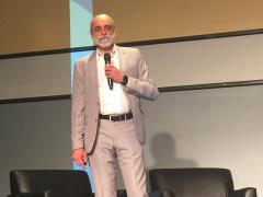 Yuvi Kochar, former chief technology officer for The Washington Post, speaks to attendees at the AFCEA-GMU C4I and Cyber Center Symposium about how CTOs can leverage technology to drive business outcomes.