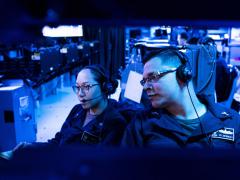 U.S. Navy cryptologic technicians stand watch in the combat information center of the USS Milius in the East China Sea. U.S. Indo-Pacific Command (INDOPACOM) intelligence experts are addressing the long-expected emergence of China as a regional adversary with global intentions. (U.S. Navy photo by MC2 Taylor DiMartino, USN)