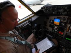 Complete electronic flight bags have been under development since 2010; however, U.S. Air Force personnel like Capt. Brett Pierson, USAF, have been using tablets as early as 2011 during preflight checks aboard a KC-135 Stratotanker aircraft bound for refueling missions in Afghanistan.