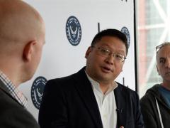 Alex Rice, chief technology officer and co-founder of HackerOne Incorporated (l), speaks with Peter Kim, Air Force chief information security officer (c), and Chris Lynch, director, Defense Digital Service, about the upcoming Hack the Air Force event.