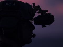 A Marine with the 31st Marine Expeditionary Unit's Force Reconnaissance Platoon waits on the flight deck while training in the Pacific Ocean. Marine Corps Systems Command unveiled its new Binocular Night Vision Goggle II that it is fielding to Force Recon and Explosive Ordnance Disposal Marines this year, with full capability next year. Photo credit: Staff Sgt. T. T. Parish, USMC