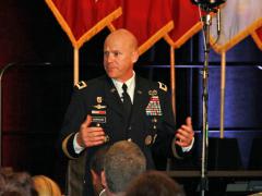 Maj. Gen. John B. Morrison Jr. (l), commander, Cyber Center of Excellence and Fort Gordon, speaks at TechNet Augusta 2017.