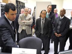U.S. Navy personnel learn about the Office of Naval Research's suite of information technology tools designed to improve fleet operations.