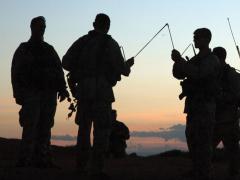 A group of U.S. Army soldiers sets up manpack radios during a recent Network Integration Evaluation exercise. The Army is on the cusp of dramatic change as it revisits its technological needs for networking in a new battlefield environment. Lt. Gen. Bruce T. Crawford, USA, is the Army chief information officer (CIO) and G-6.