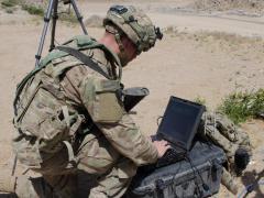 A soldier with the 780th Military Intelligence Brigade sets up cyber tools at the National Training Center as part of the U.S. Army’s cyber electromagnetic activities (CEMA) initiative led by Army Cyber Command. The service is consolidating electronic warfare and cyber training and operations at Fort Gordon, Georgia, facilities to integrate all aspects of the disciplines.