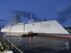 The U.S. Navy’s newest destroyer, the USS Zumwalt, departs its dry dock at Bath Iron Works, Maine, prior to conducting at-sea trials in the Atlantic Ocean. The technology-rich Zumwalt may serve as a template not only for future Navy ships but also for a highly skilled crew capable of handling multiple tasks.