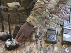 U.S. Special Operations Command (SOCOM) personnel and partner nation representatives examine SOF radio equipment at Air Force Special Operations Command. SOCOM seeks radios that are independent of partners or places so that SOF operators on the move can communicate seamlessly.