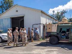U.S. Marines learn about network and communication technology available at the 2014 Agile Bloodhound demonstration in Hawaii.