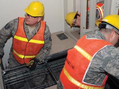 Select personnel from 15 Air National Guard Engineering and Installation organizations are installing more than 600 miles of cabling in support of the U.S. Strategic Command (STRATCOM), Command and Control facility (C2F) construction project. U.S. Air Force photo by Steve Cunningham