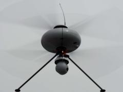 A French unmanned aerial vehicle hovers in front of a crowd during a demonstration at the Brunei Darussalam International Defense Exhibition in Bandar Seri Begawan in 2013. The exercise focuses on multilateral relationships and enhances preparedness for disasters and other operations.