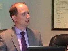 Jonathan Williams, an attorney with PilieroMazza PLLC, discusses new rules of the SBA's mentor-protege program during a meeting of AFCEA International’s Small Business Committee.